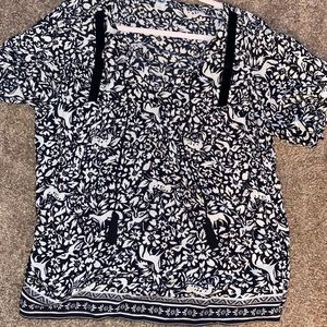 Floral black and white blouse.